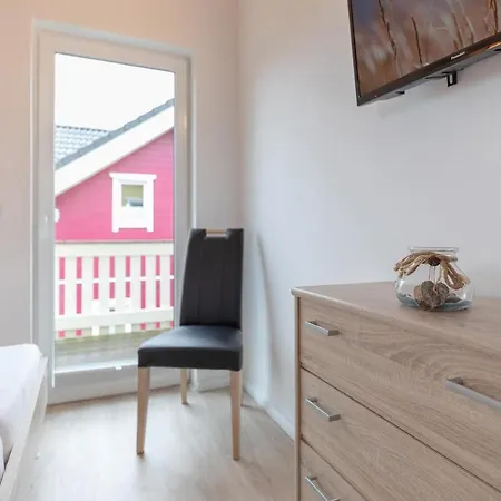 Seepark Ferienhaus Seerose 7 Hébergement de vacances Süssau